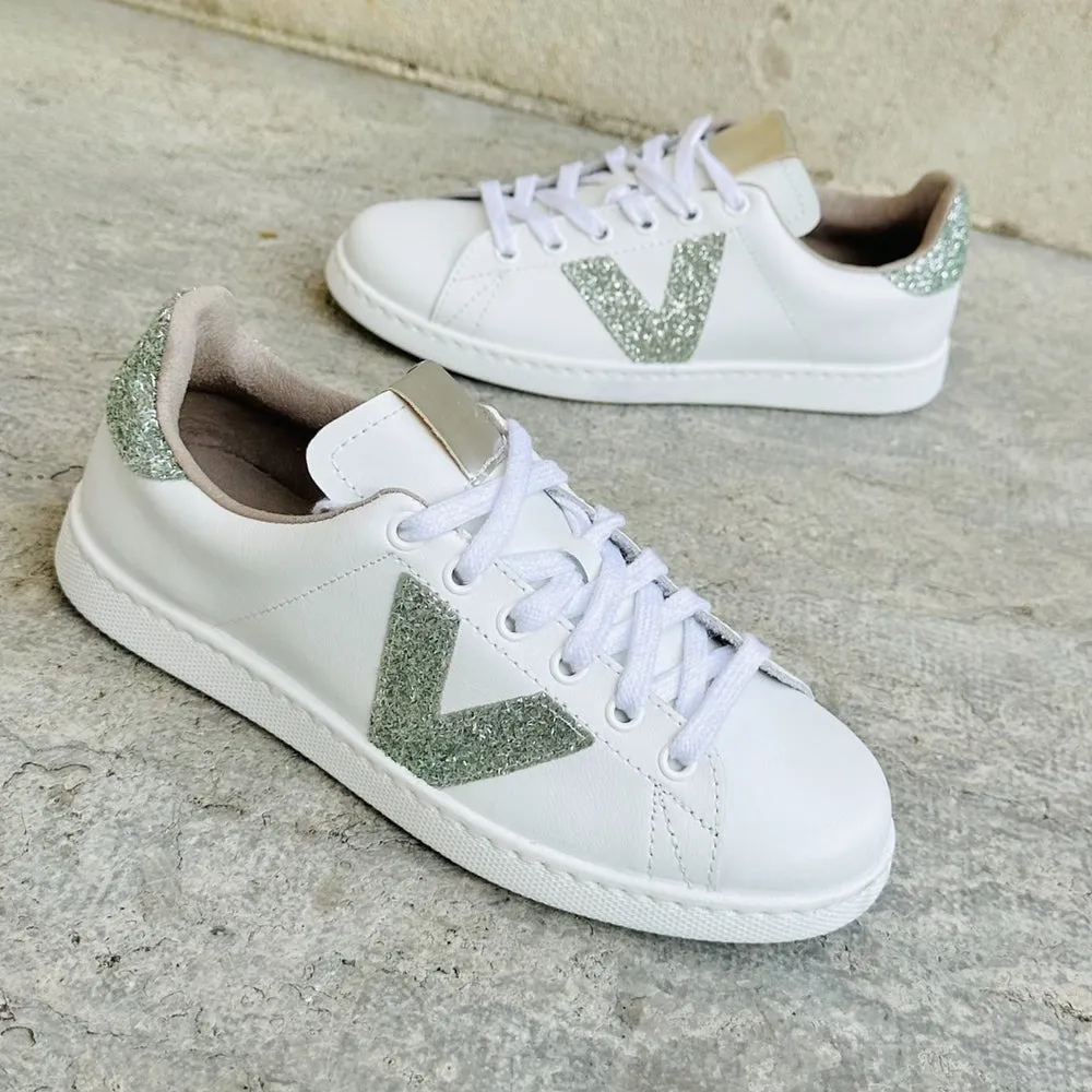 White sneaker with jade glitter logo